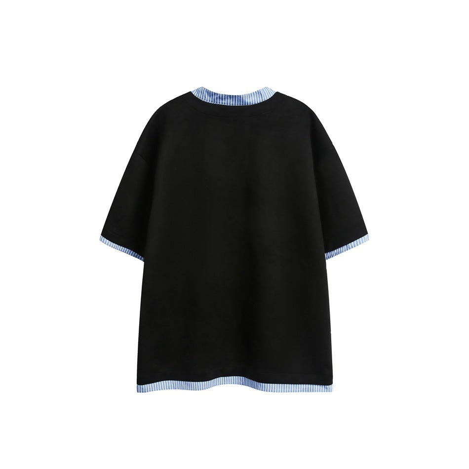 Back view of a black oversized short-sleeve top with blue striped trim at the collar, cuffs, and hem.