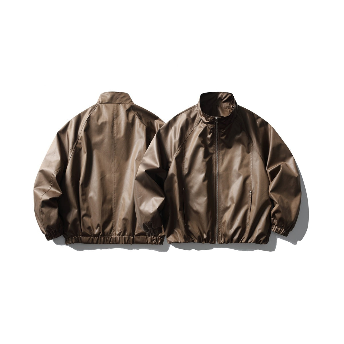 Dark brown jacket shown from the front and back, with a stand collar, zip front, and gathered cuffs and hem.