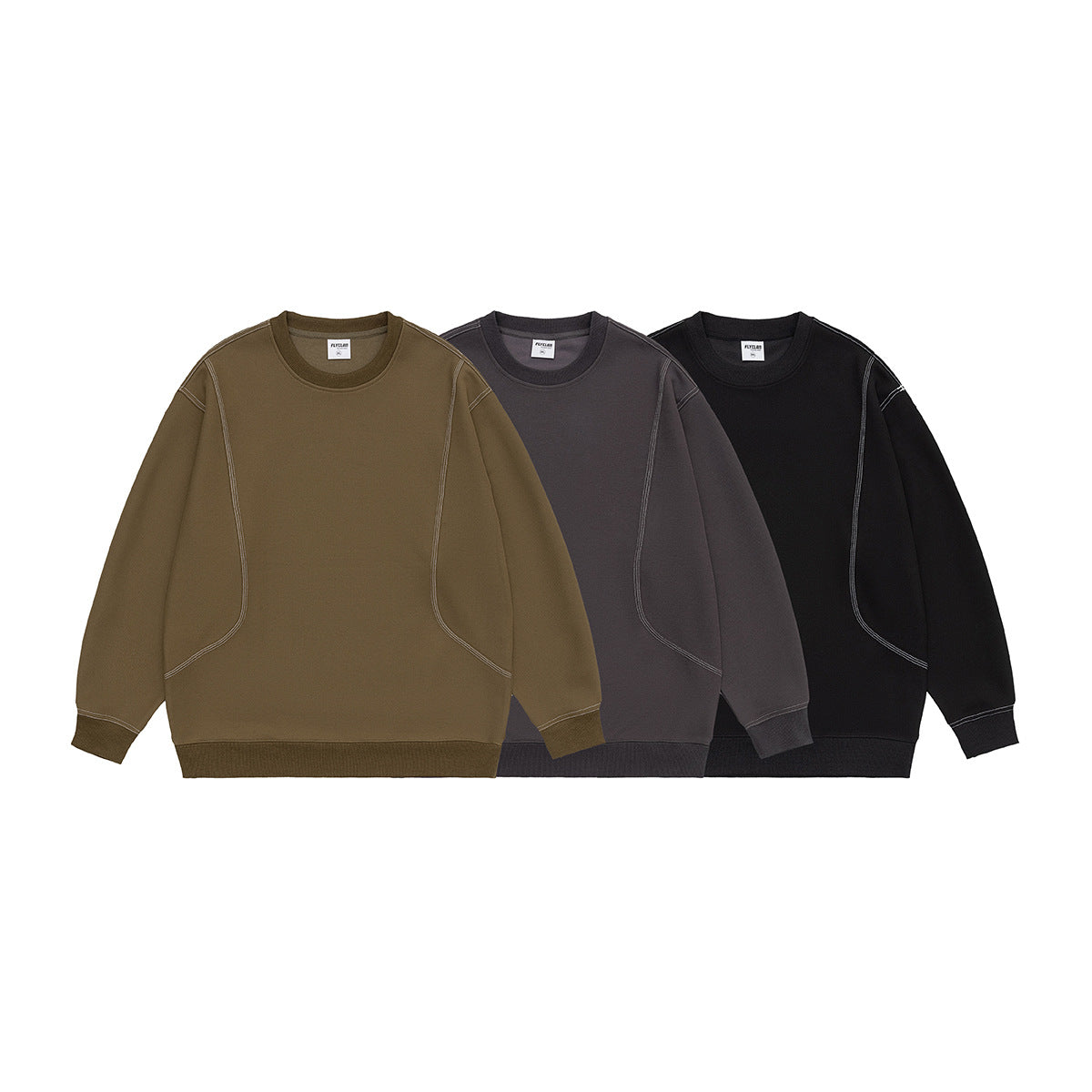 Three crewneck sweatshirts shown together in olive, charcoal, and black, each with contrast stitching and ribbed trim.