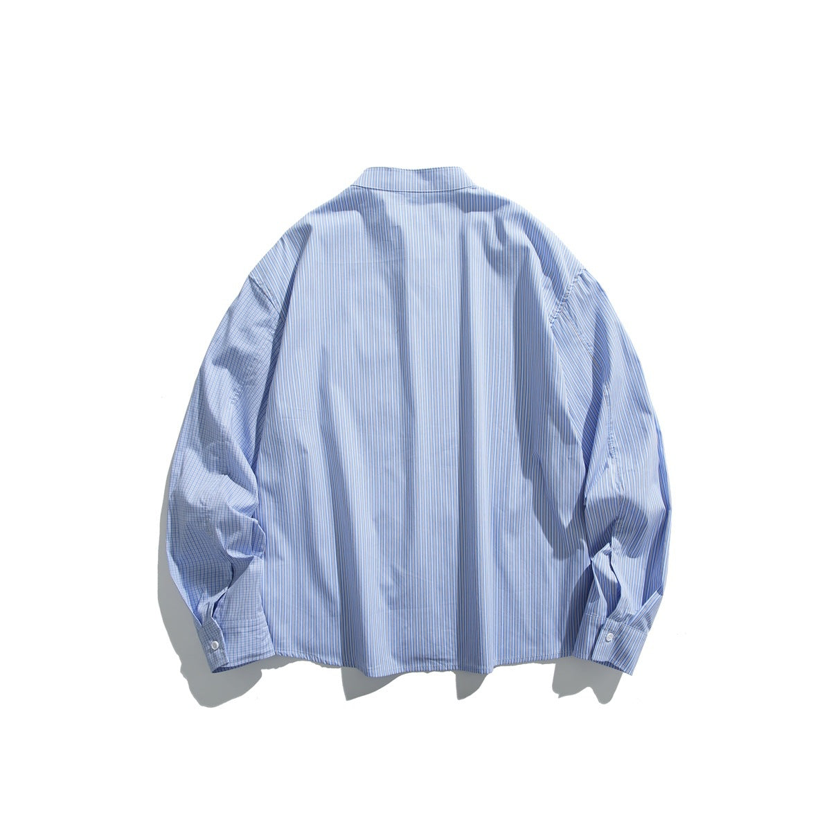 Back view of a light blue striped button-up shirt laid flat, with long sleeves and a band collar.