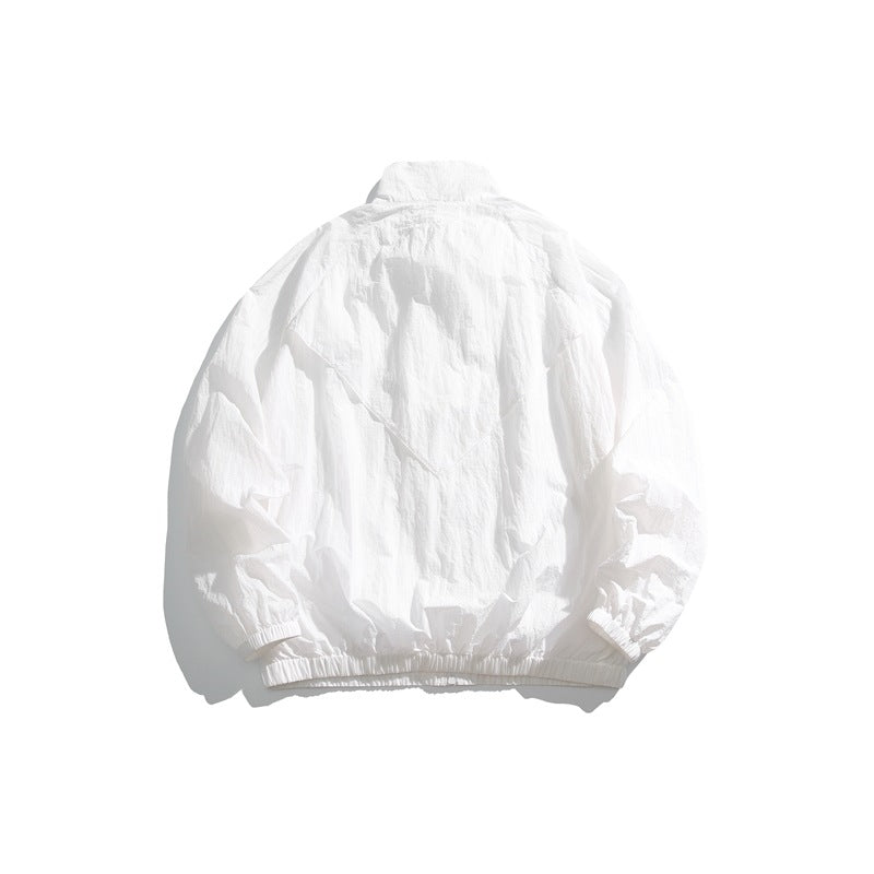 White jacket shown from the back, with a layered flap, high collar, elastic cuffs and hem.