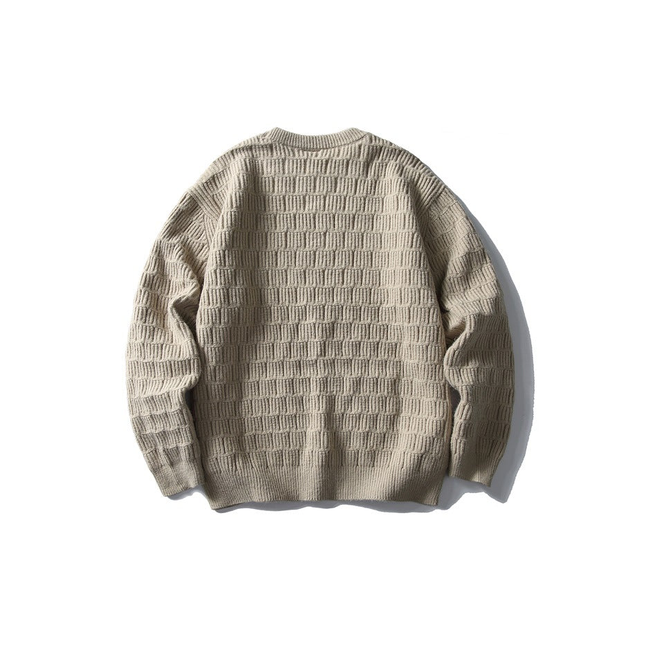 Back view of a beige crewneck sweater with a raised horizontal knit pattern.