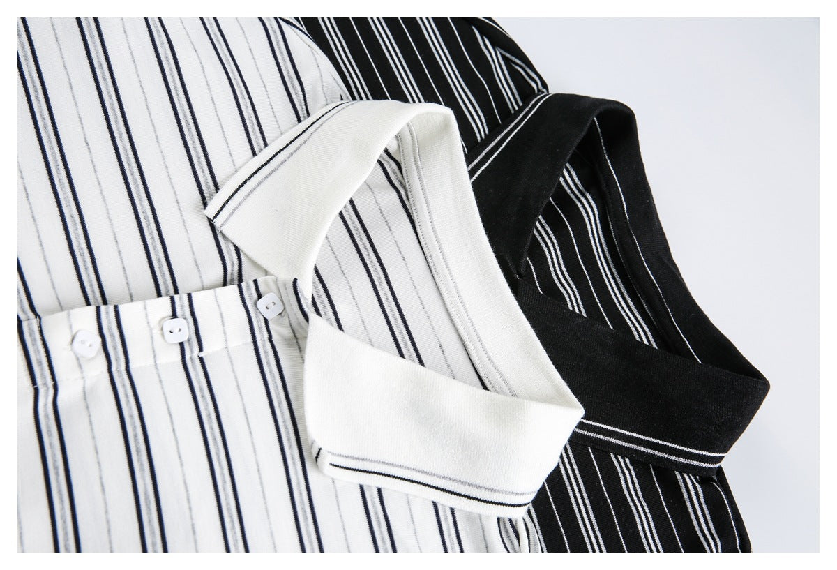 Close-up of white and black striped polo shirts showing contrasting collars and white buttons.