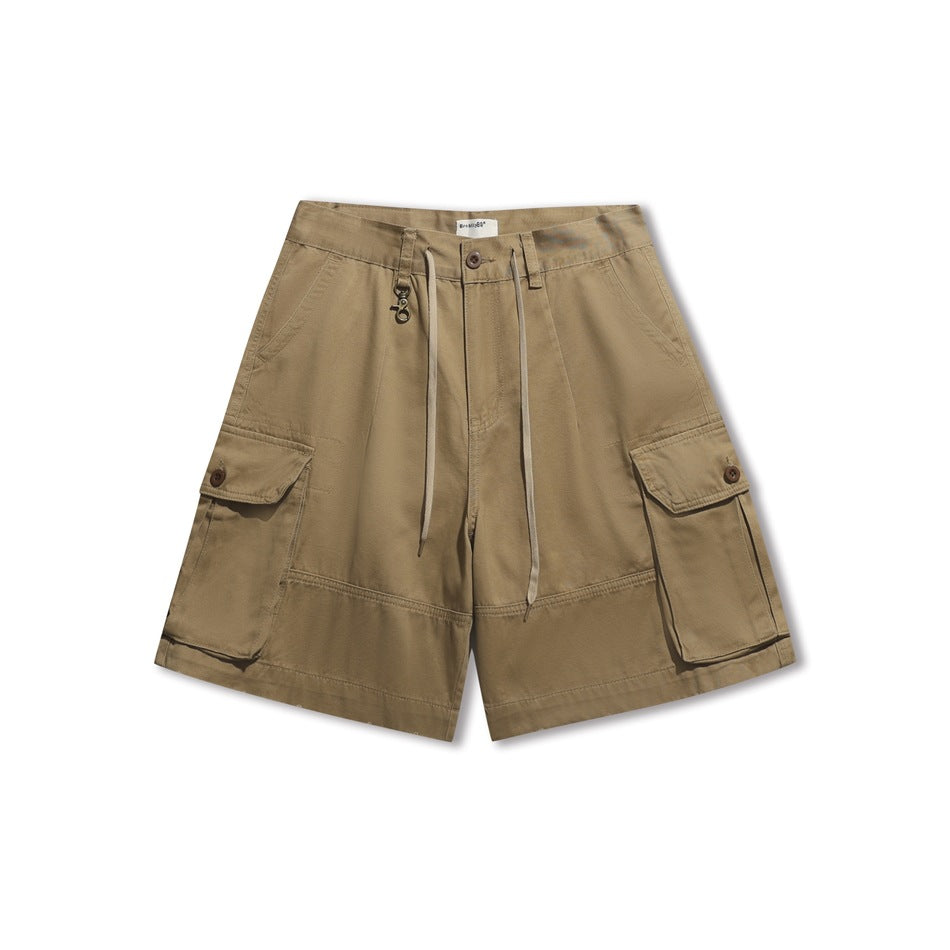 Khaki cargo shorts front view with drawstring waist, clip charm and large button flap cargo pockets