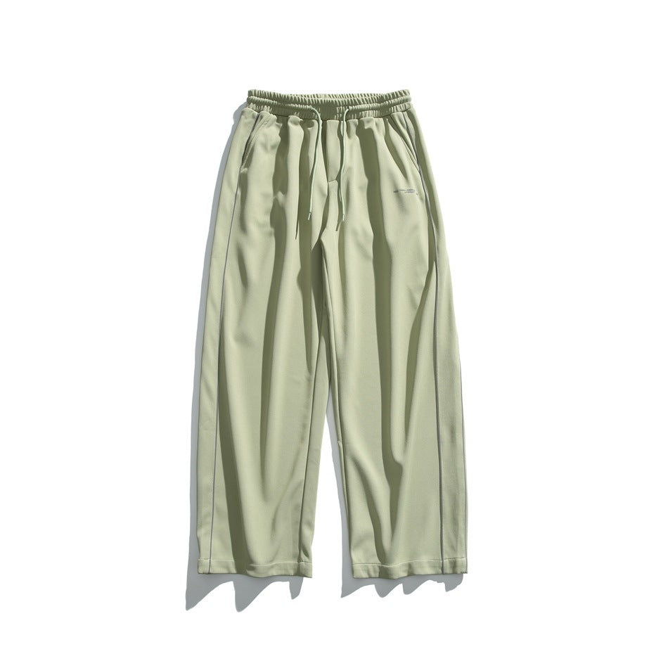 Fruit green wide-leg drawstring pants with side piping, flat lay front view
