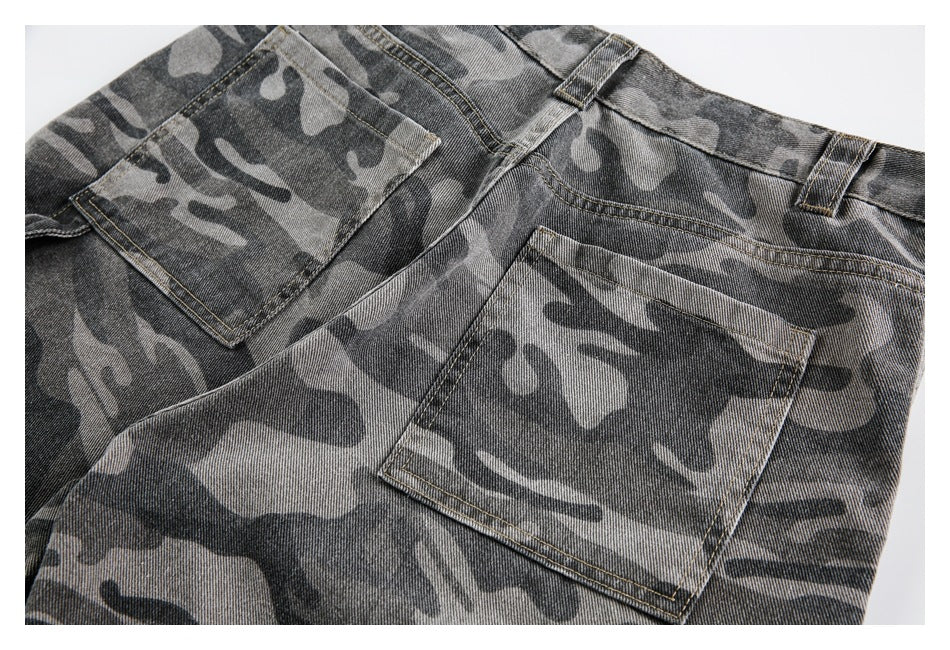 Cropped back view of gray camouflage denim pants with two rear patch pockets and belt loops.