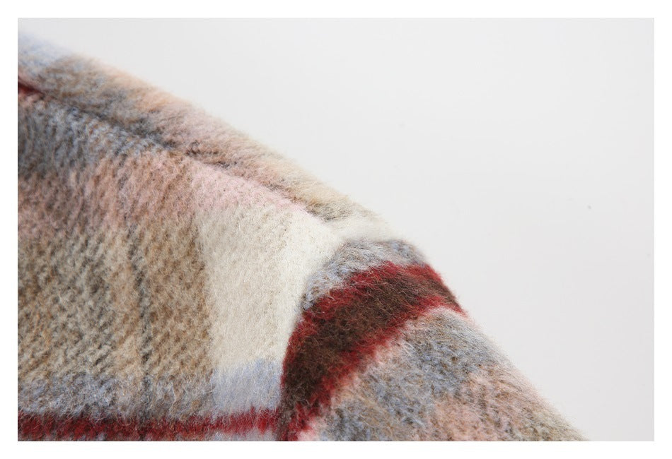 Close-up of the jacket's fuzzy plaid fabric in beige, gray, cream, pink, and burgundy.
