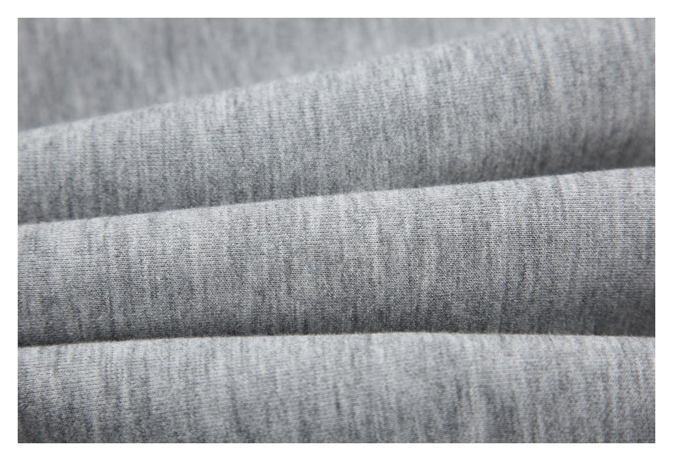 Close-up showing the heather gray fabric's fine surface texture.