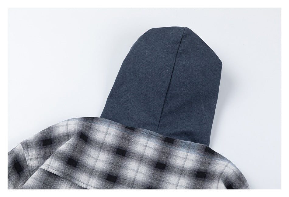Back view of a gray plaid shirt with a solid navy hood, shown flat against a light background.