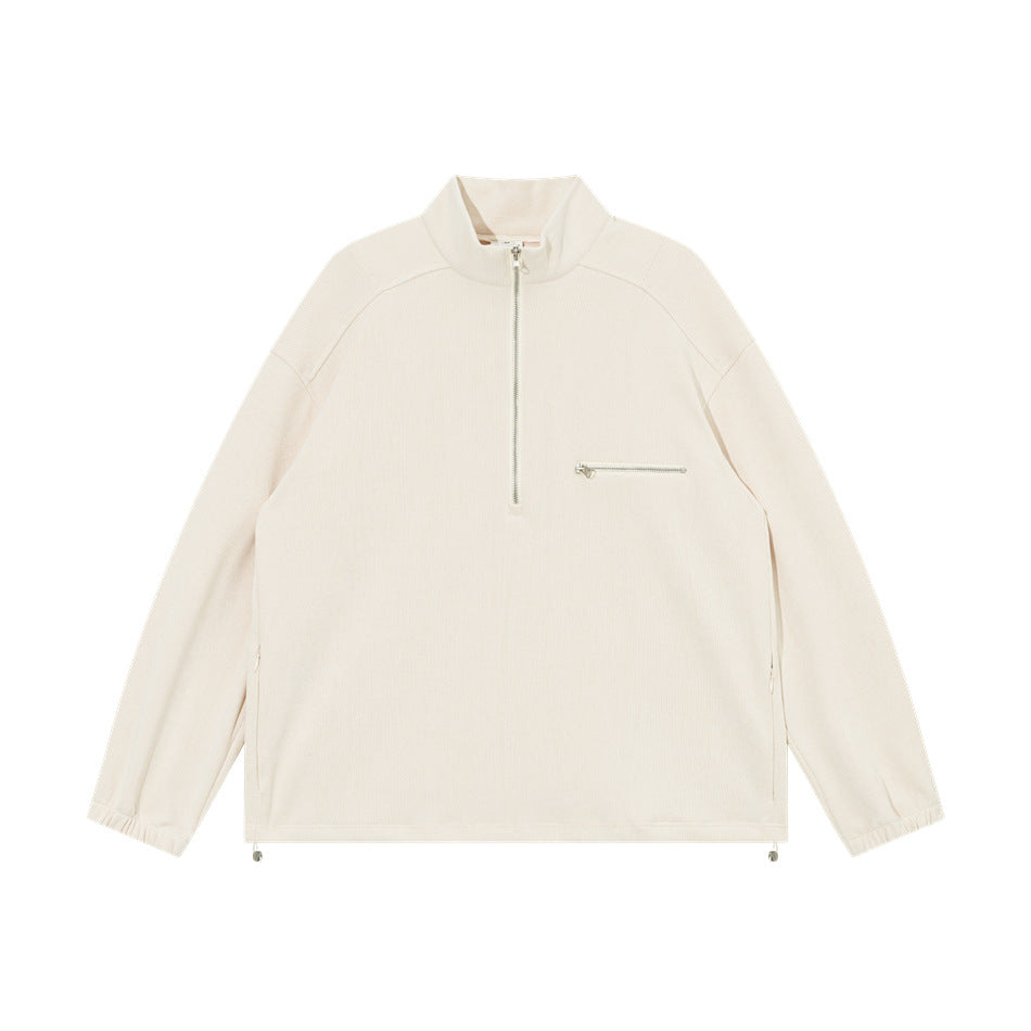 Apricot half-zip stand-collar pullover flat lay with zippered chest pocket, elastic cuffs and hem drawcords