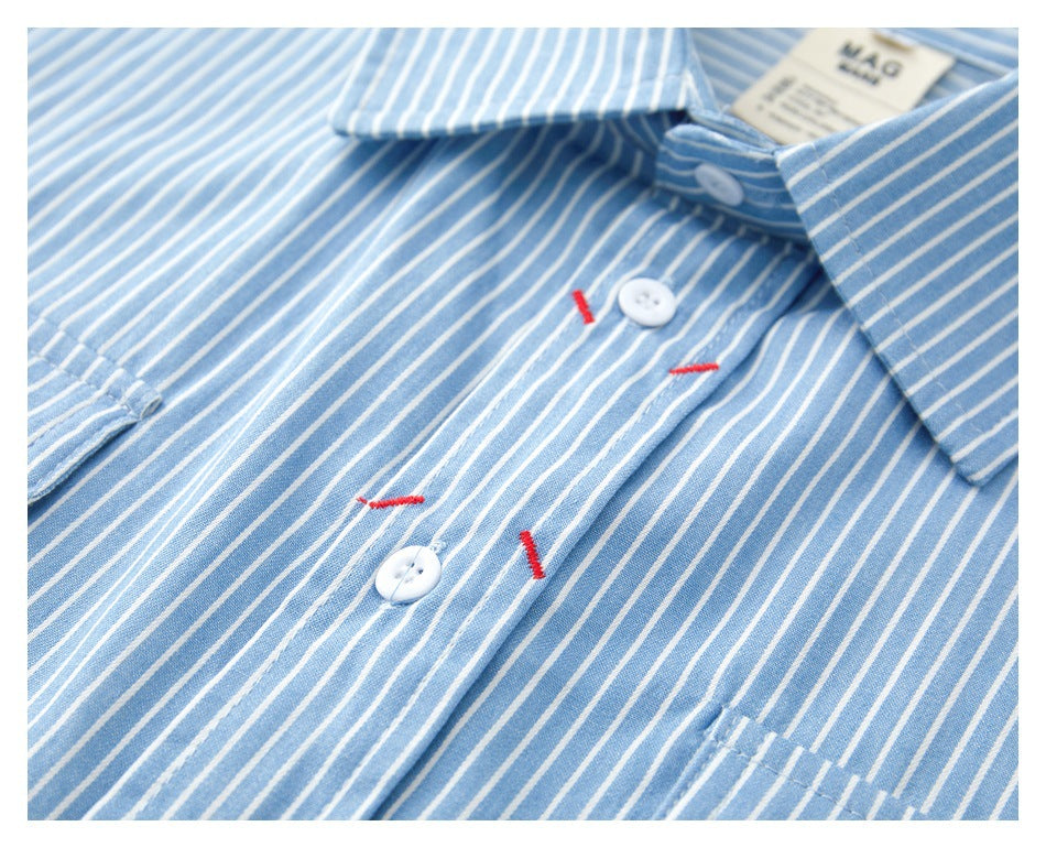 Close-up of a blue-and-white striped shirt collar and button placket with red bar tacks and an inner neck label.