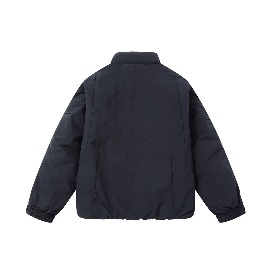 Back view of a plain dark navy jacket with a stand collar and elasticated cuffs and hem.