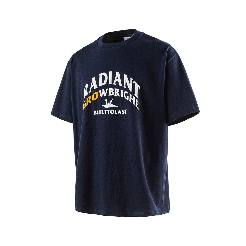 Front view of a navy short-sleeve T-shirt with a large white and yellow chest graphic and text.