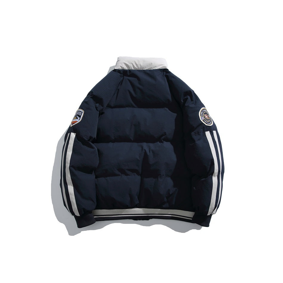 Back view of a navy puffer jacket with a white collar, sleeve patches, white sleeve stripes and striped hem.