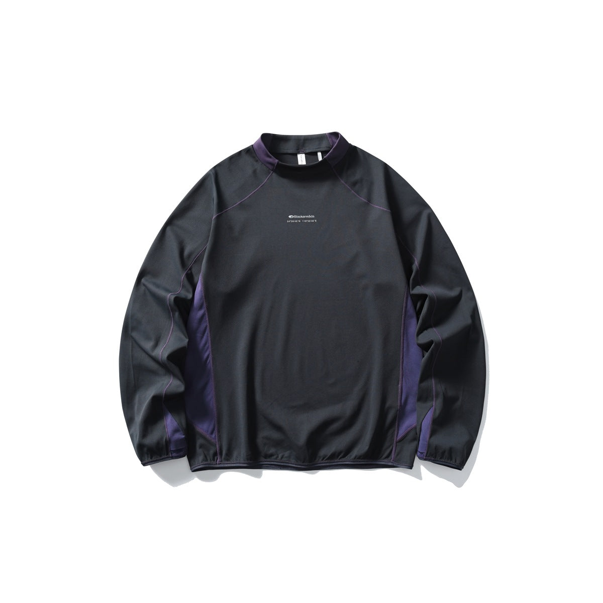 Dark charcoal long-sleeve mock neck top with purple collar trim, side panels and purple contrast stitching, flat lay