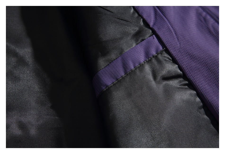 Close-up of the jacket's black lining with a purple fabric trim.