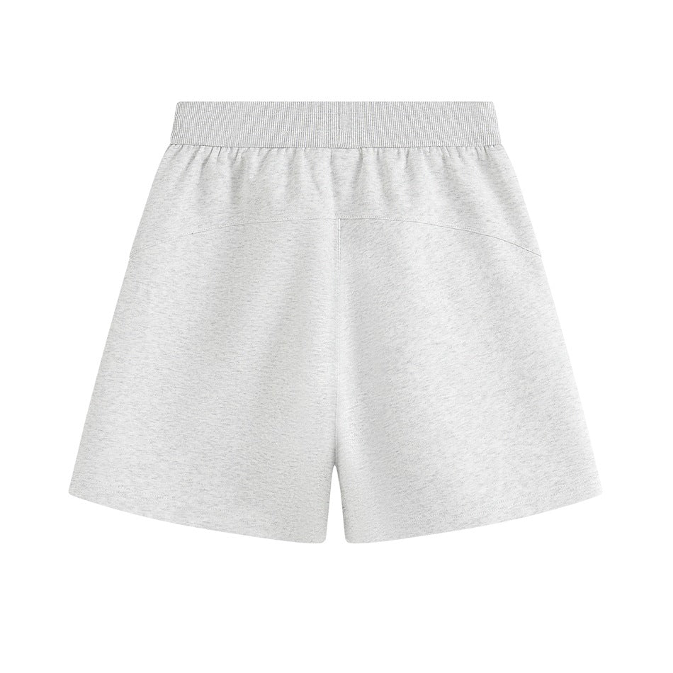Back view of light heather gray shorts with ribbed waistband, curved yoke seam and center back seam