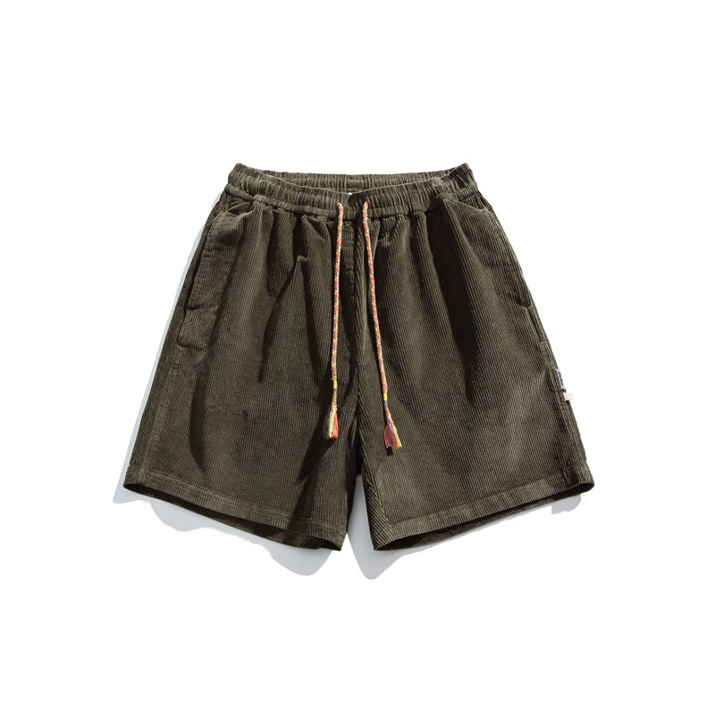 Army green corduroy shorts with elastic waist and braided drawcord, front flat lay
