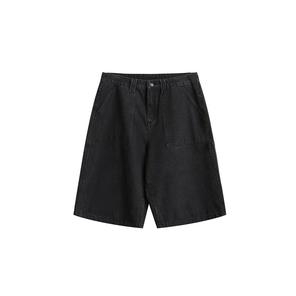 Washed black denim knee-length shorts, front view, with large patch pockets, button fly and belt loops