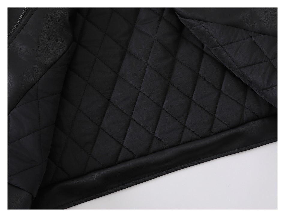 Close-up of the black jacket's interior, showing diamond-quilted lining.