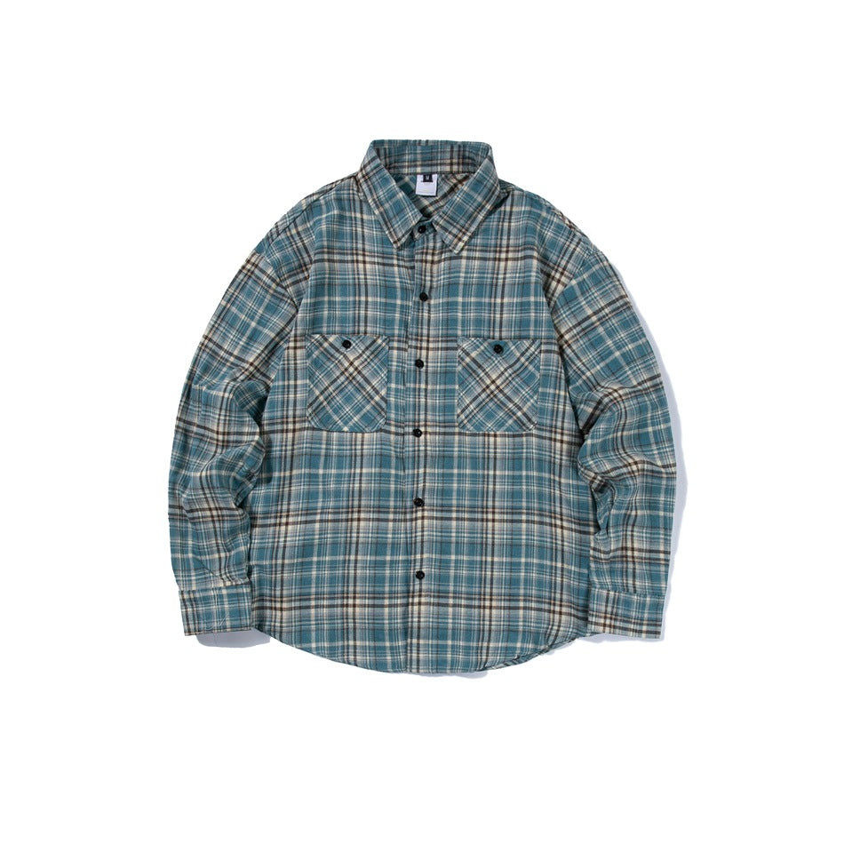 Lake blue plaid long-sleeve button-up shirt with two chest flap pockets, laid flat, front view