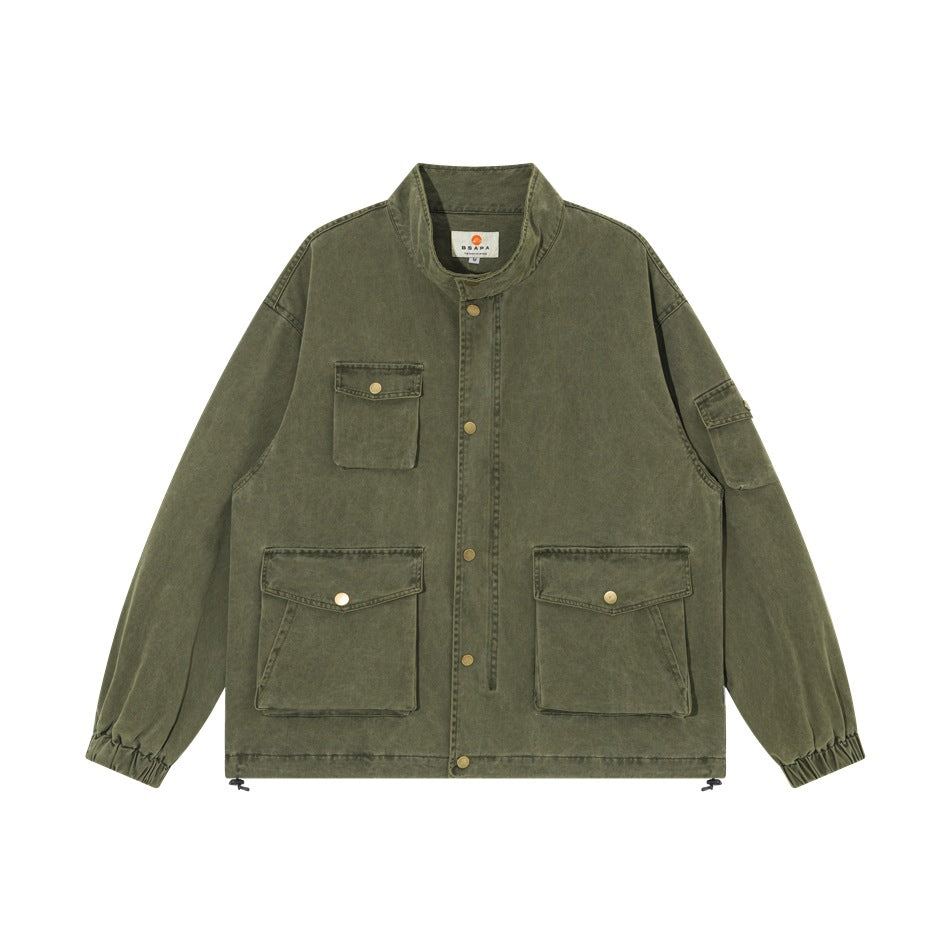 Olive green washed stand-collar jacket flat lay with snap front, flap pockets, sleeve pocket and drawstring hem