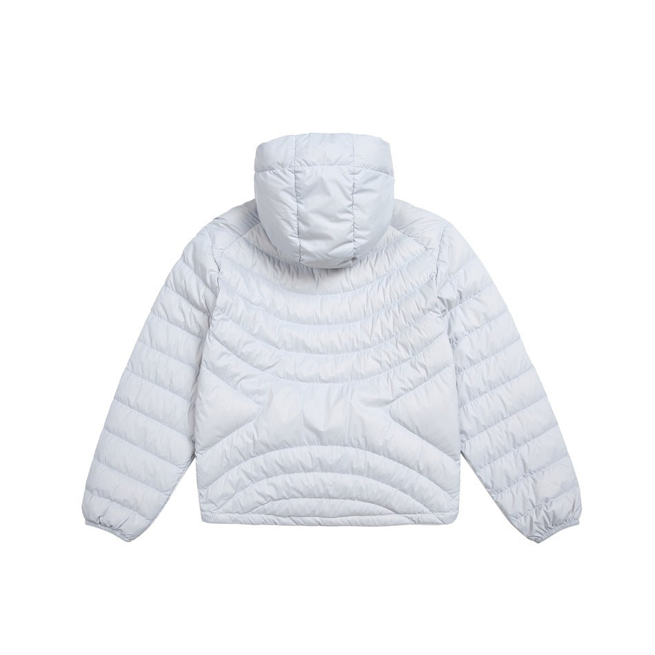 Back view of a white quilted hooded jacket with curved quilting and long sleeves.
