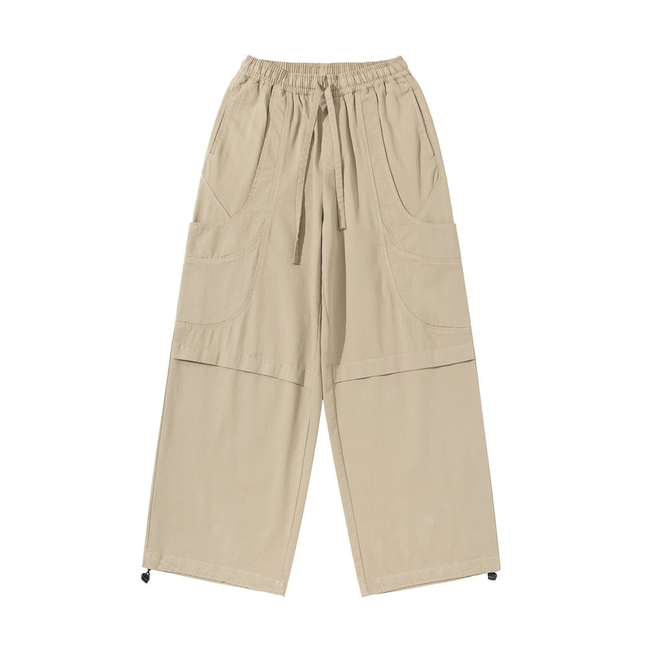 Light khaki wide-leg cargo pants flat lay, front view with drawstring waist, side pockets and drawcord ankle hems