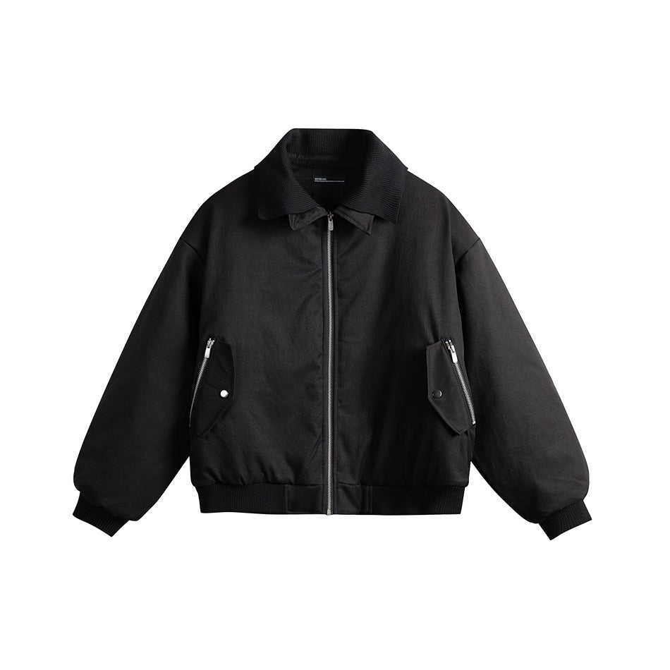 Black padded bomber jacket with ribbed collar, cuffs and hem, front zipper and two zip flap pockets