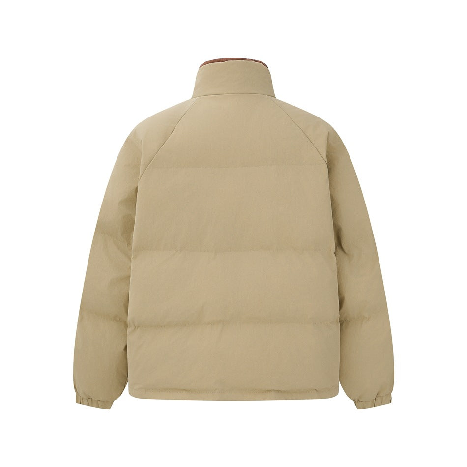 Back view of a beige quilted jacket with a high collar and elasticated cuffs on a white background.