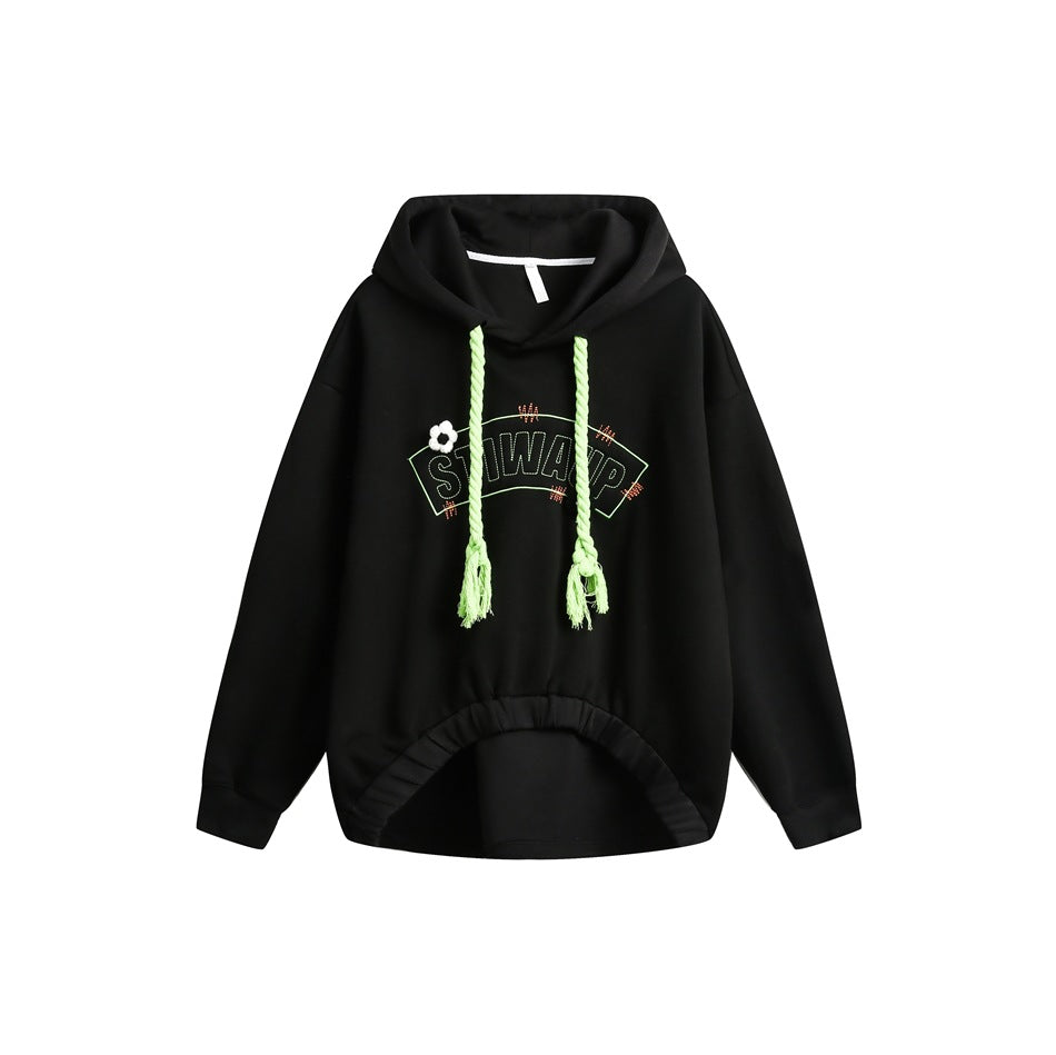 Black pullover hoodie with neon green rope drawstrings, embroidered arched lettering, flower accent and gathered hem