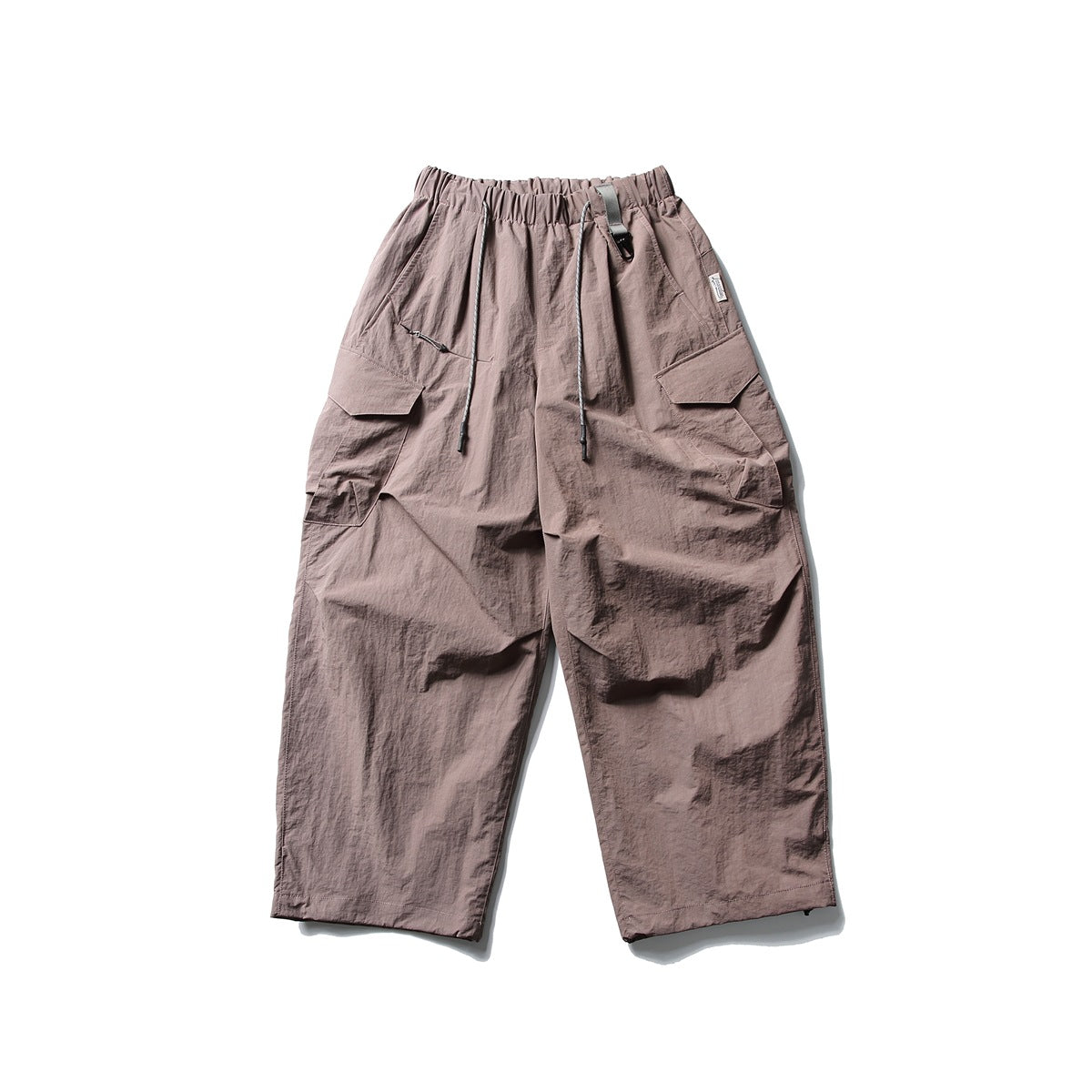 Front view of dusty mauve wide-leg cargo pants with an elastic drawstring waist and large flap pockets.
