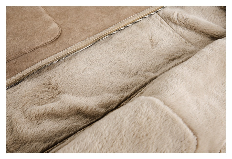 Open tan coat showing a zipper, pocket edge, and plush pale lining.