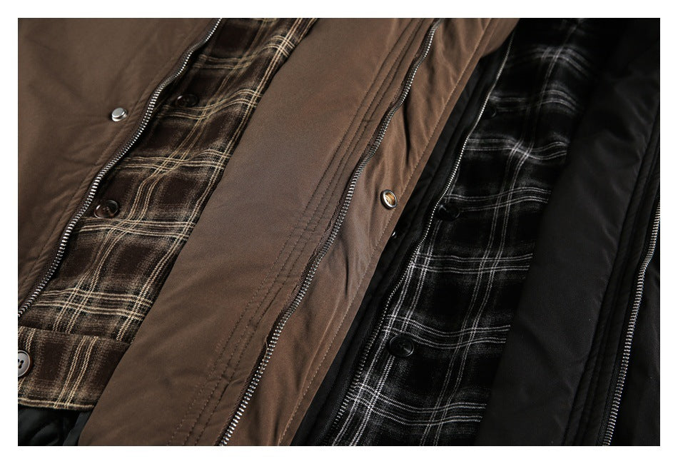 Close-up of brown and black jackets with plaid inner panels, buttons, and open zippers.
