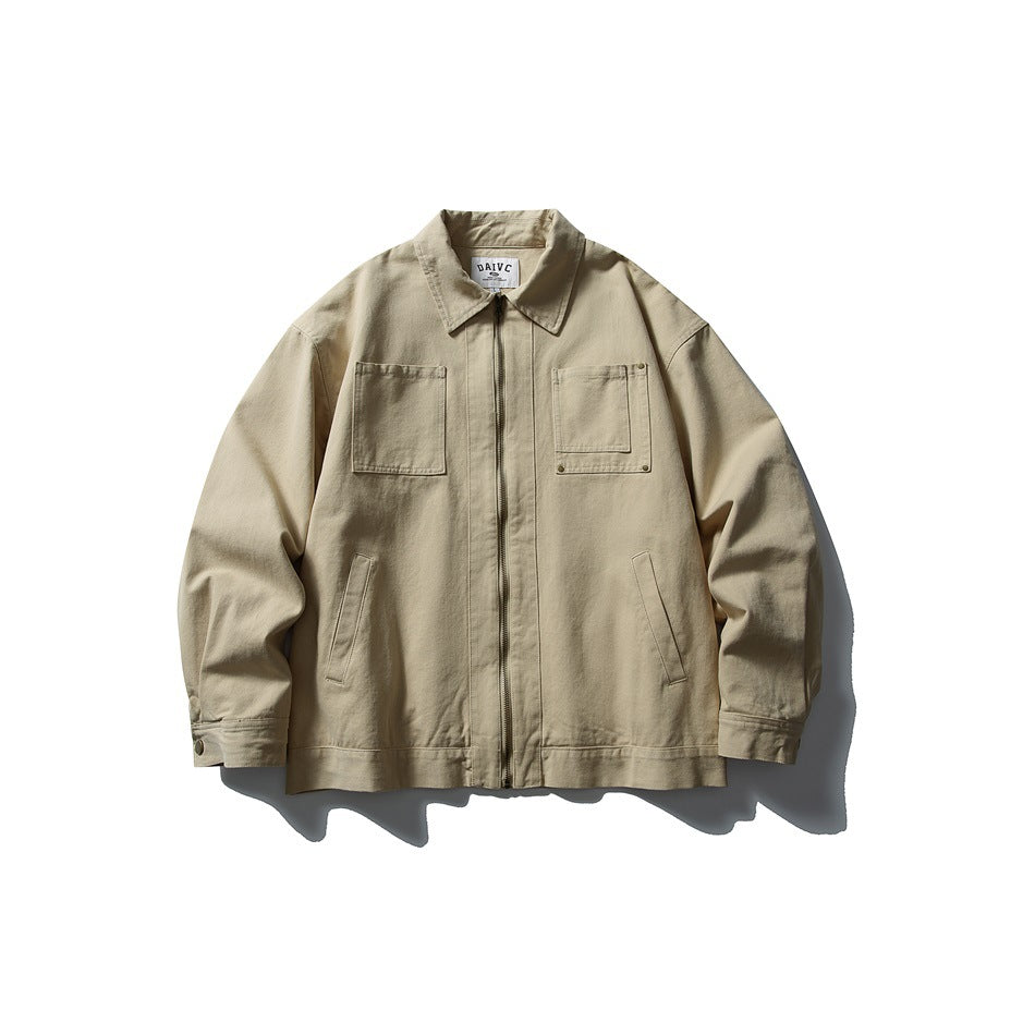 Khaki zip-front jacket with pointed collar, chest patch pockets, slant pockets and button-tab cuffs, flat front view
