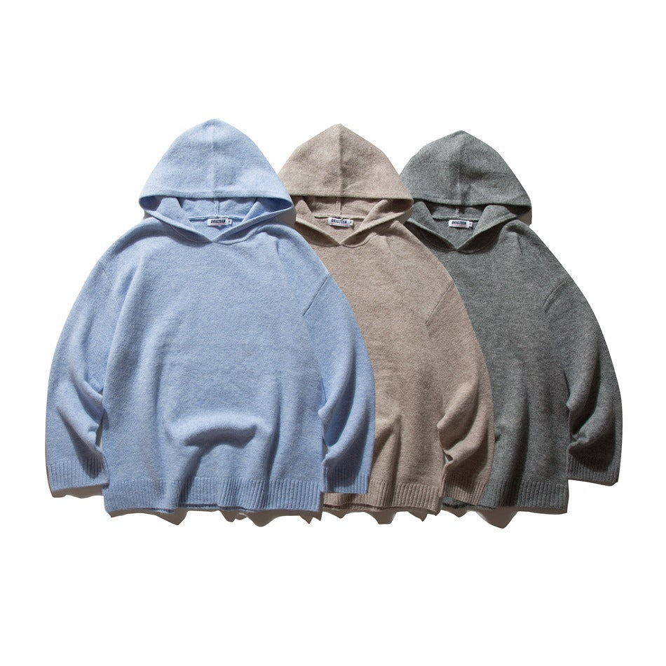 Three hooded knit sweaters displayed from the front in light blue, beige, and charcoal gray.