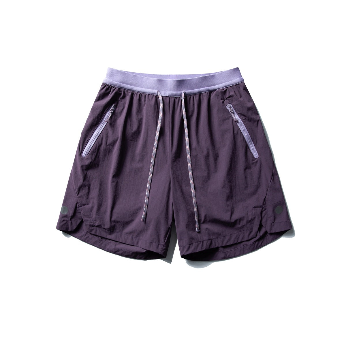 Grape purple drawstring shorts with lilac waistband and lilac zippered pockets, flat lay