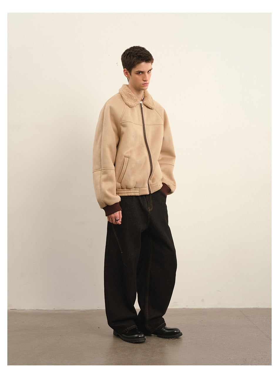 Model wearing a light beige zip-front jacket with a plush collar and dark cuffs, shown at a three-quarter angle.