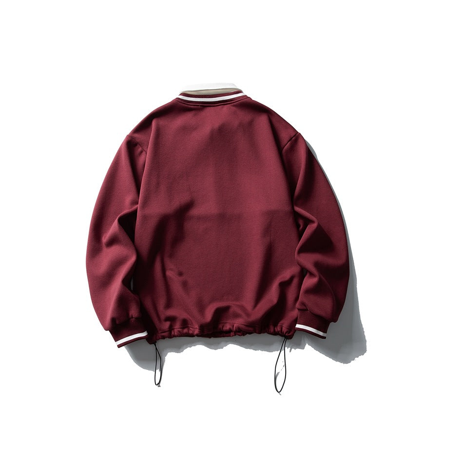 Back view of burgundy sweatshirt with striped collar trim, striped cuffs and drawstring hem toggles
