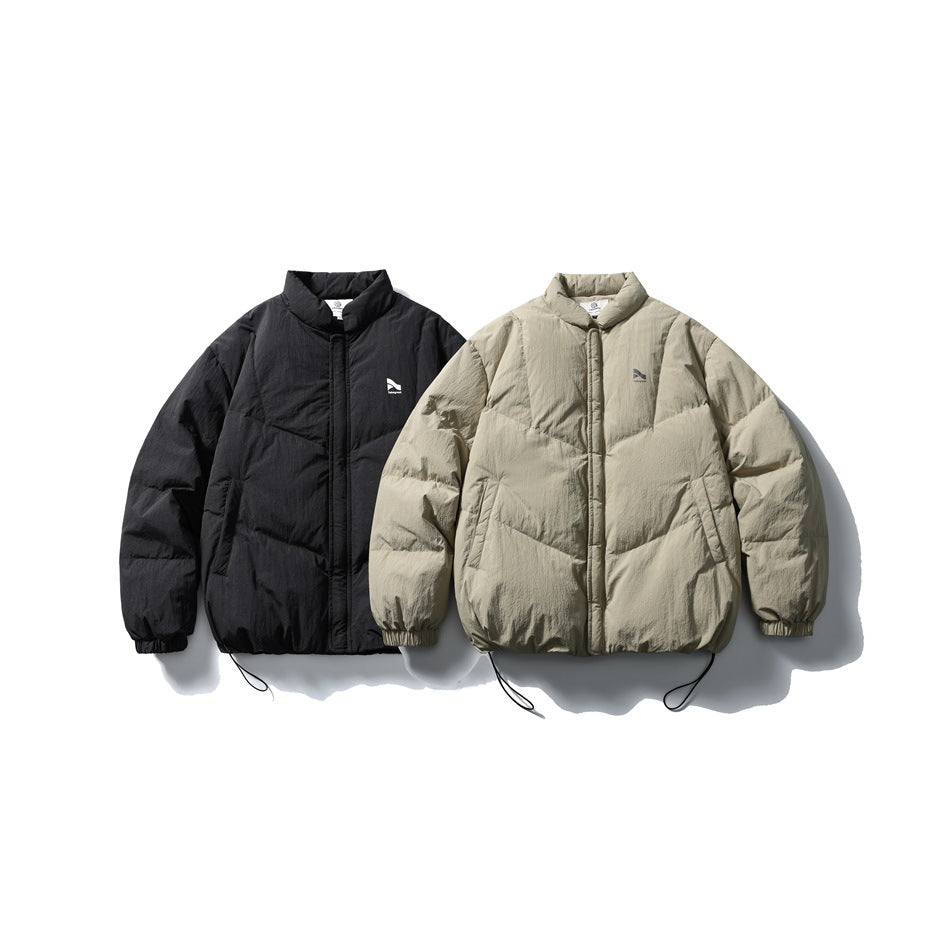 Black and light beige quilted jackets shown from the front, with high collars, pockets, and elastic cuffs.