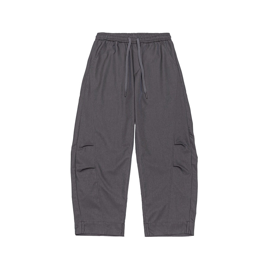 Dusty purple-gray wide-leg drawstring pants, front flat lay with pleated side details and tabbed hems