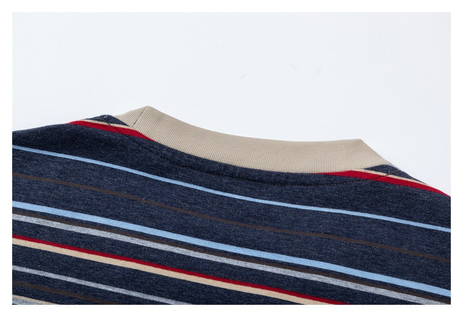 Close-up of the striped garment's back neckline with a beige ribbed collar.