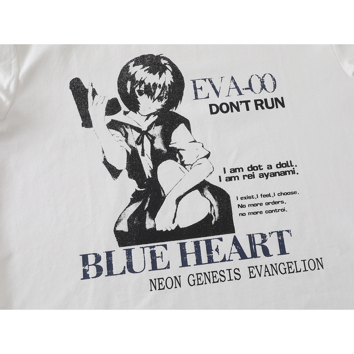 Close-up of a white T-shirt with a black anime character graphic and English lettering.