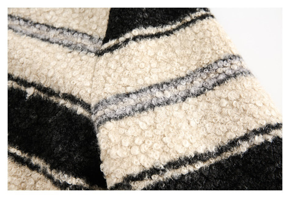 Close-up of the jacket’s fuzzy striped sleeve and seam.