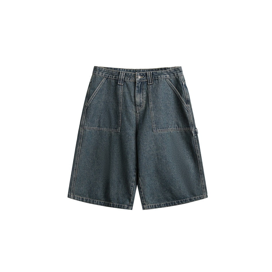 Faded blue denim knee-length shorts, front view, with large patch pockets, button fly and contrast stitching
