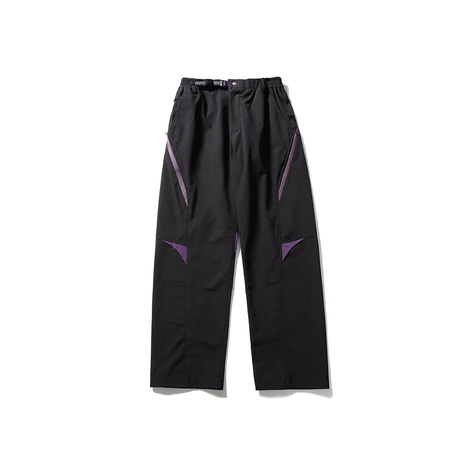 Black wide-leg pants with purple zipper and knee panel accents, belt buckle and elastic waist, laid flat