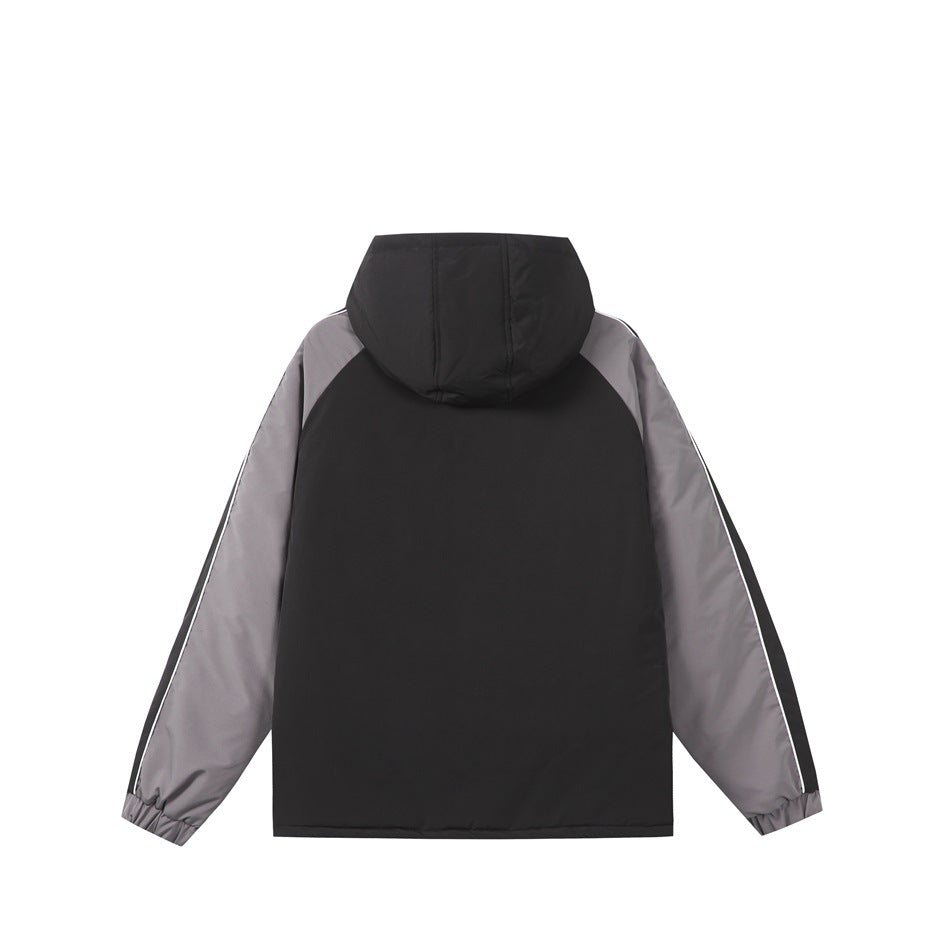 Back of a black hooded jacket with gray sleeves, white sleeve piping, and elastic cuffs.