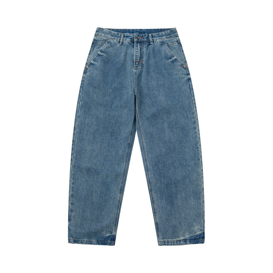 Front flat view of light blue faded denim jeans with a relaxed wide straight leg and angled front pockets