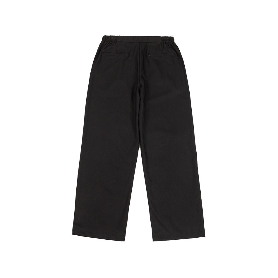 Back view of black wide-leg trousers with an elasticated waistband and two welt pockets.