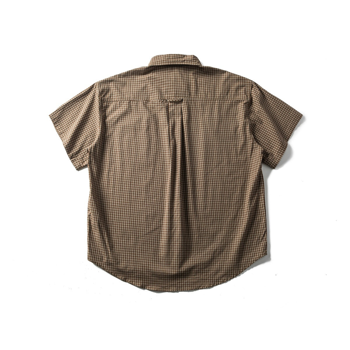 Back view of a brown plaid short-sleeve button-up shirt with a center back pleat.